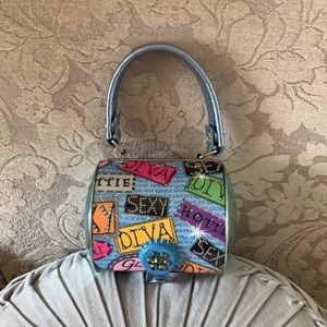 Prezzo round , metal blue diva design handbag  never used , smoke free home